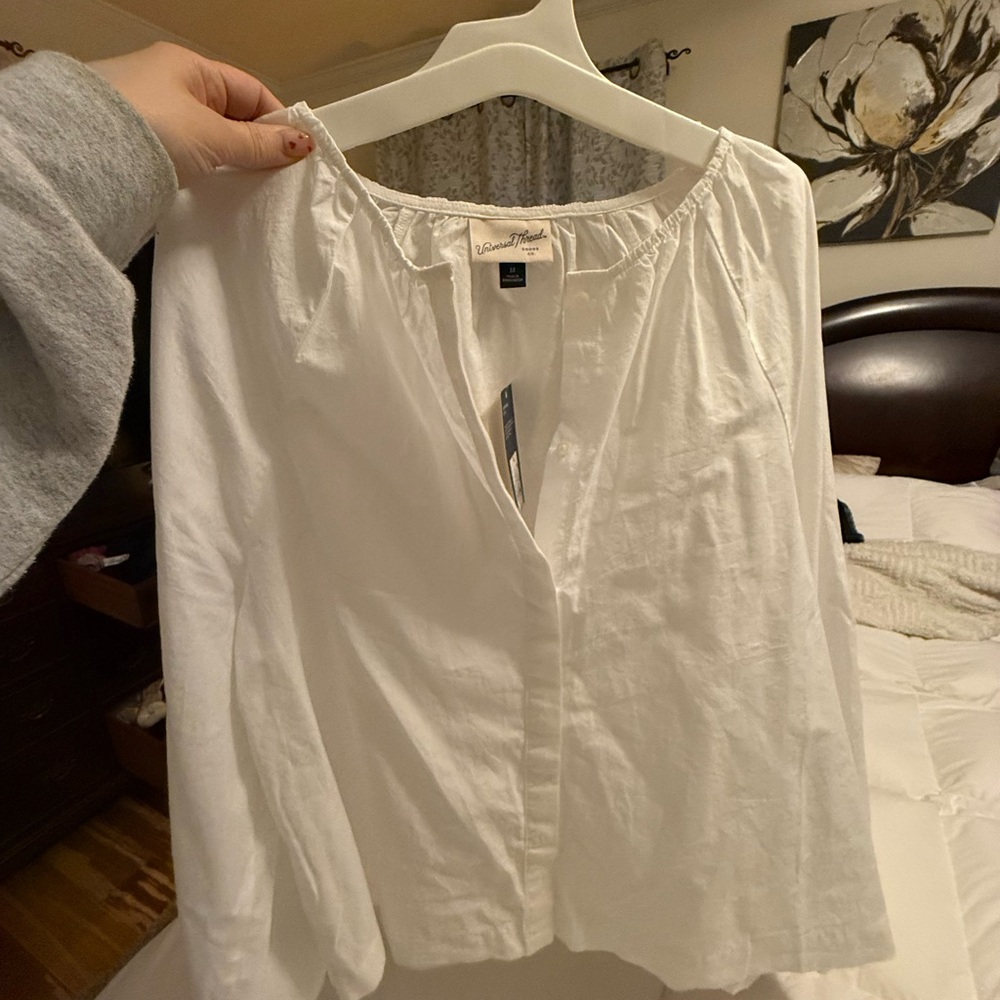 Elegant White Blouse and Flowy Sleeves